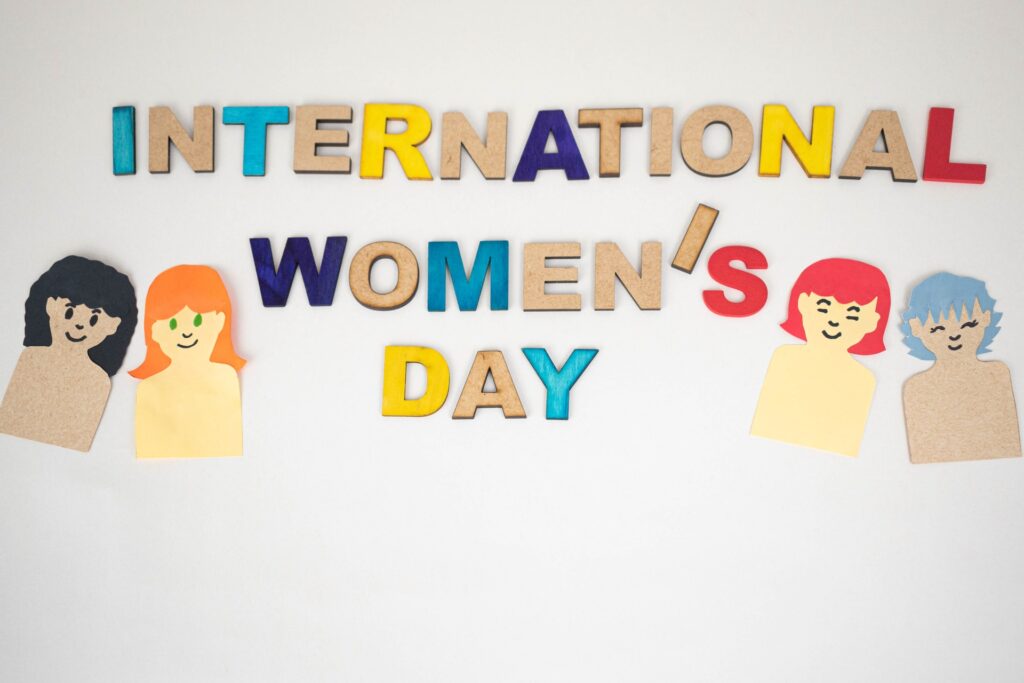 women in cybersecurity collaborating and celebrating diversity